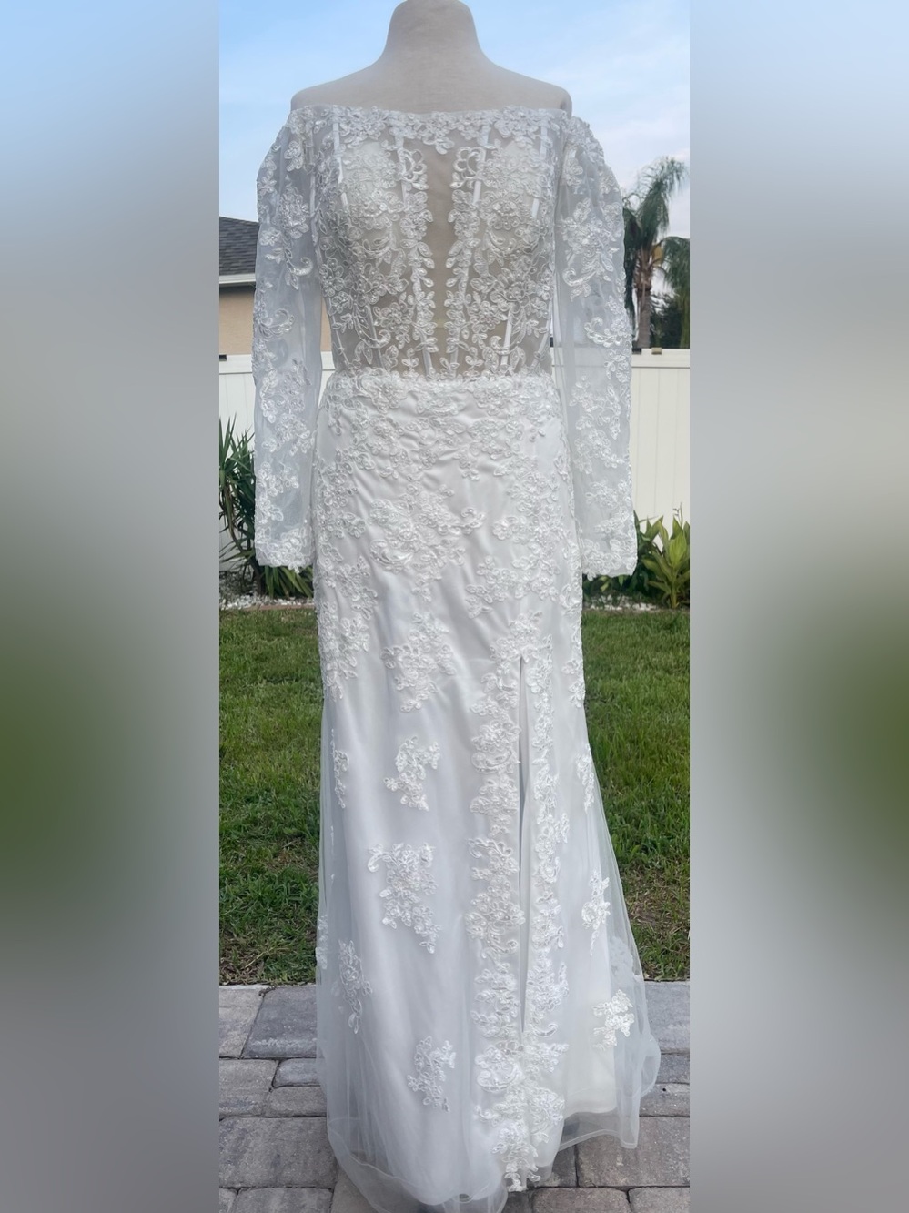Off-Shoulder White Lace Bridal Gown with Long Sleeves